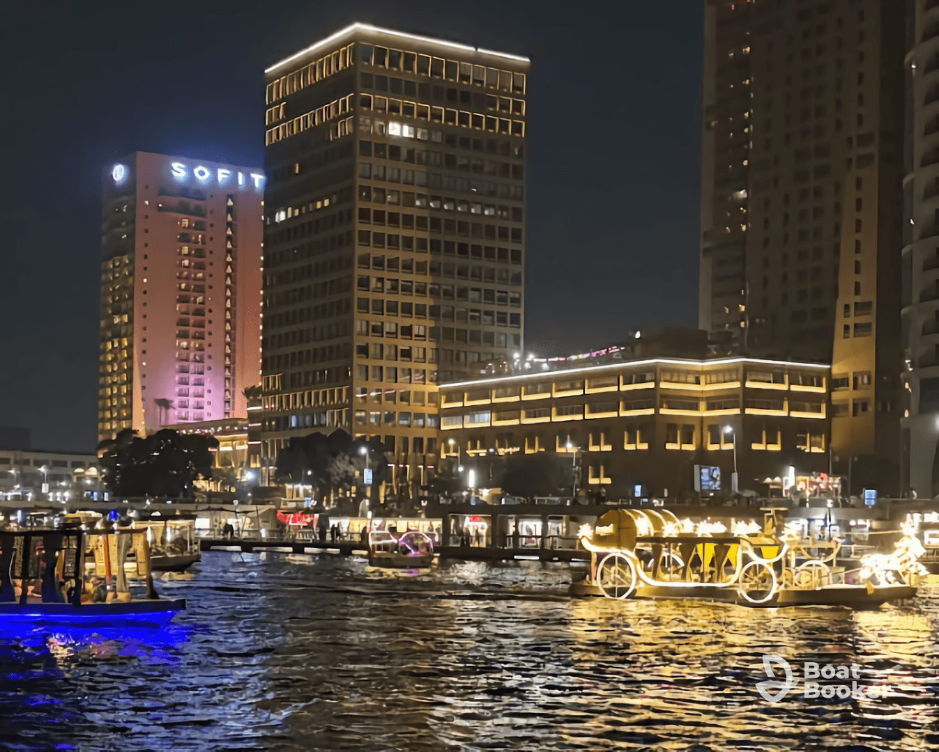 A vibrant night scene showcasing illuminated boats on the water against a backdrop of city skyscrapers, perfect for capturing the lively atmosphere of urban waterfronts.