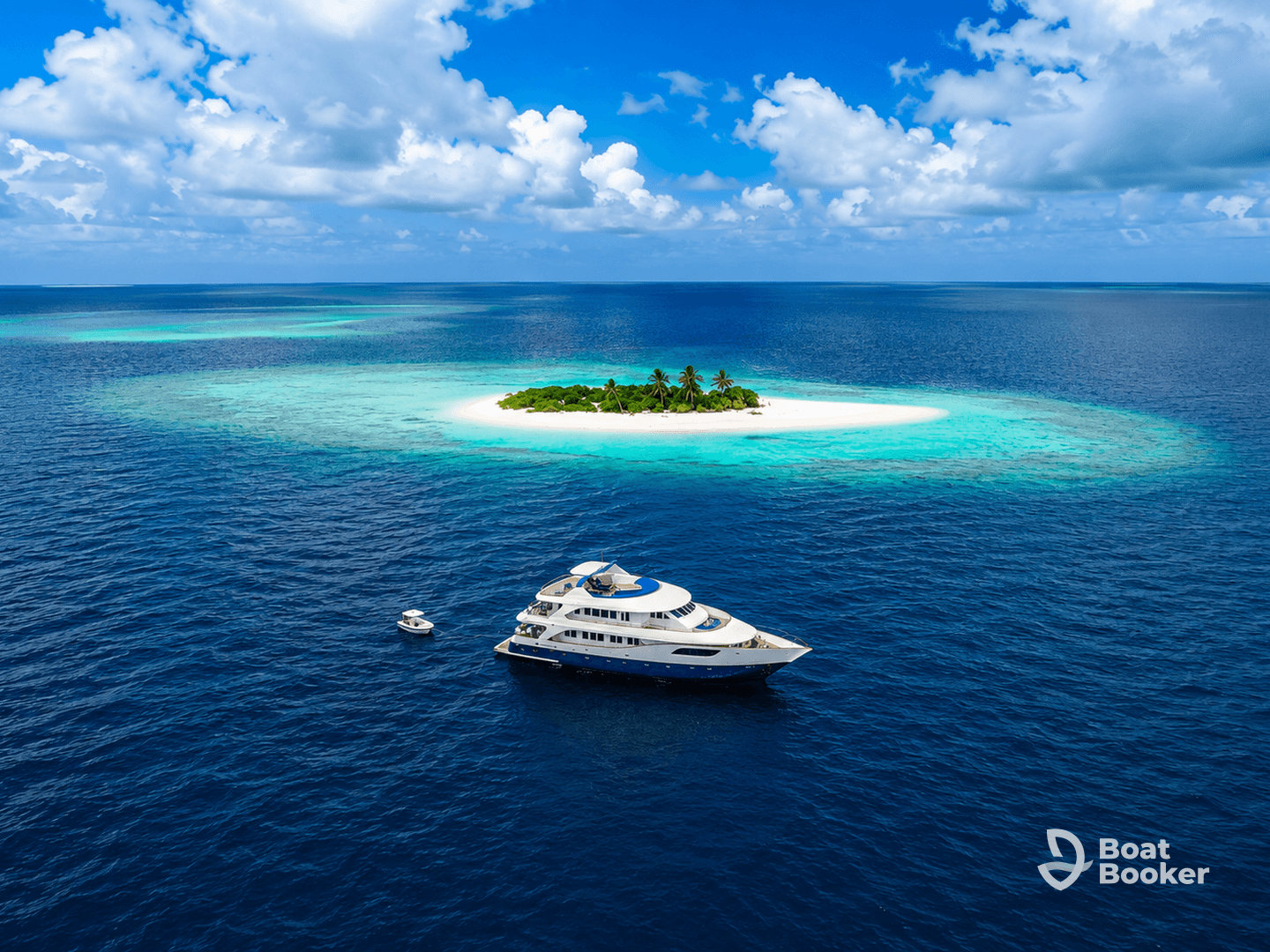 A stunning aerial view of a luxurious yacht cruising near a tropical island, showcasing the beauty of the open sea and pristine beaches.