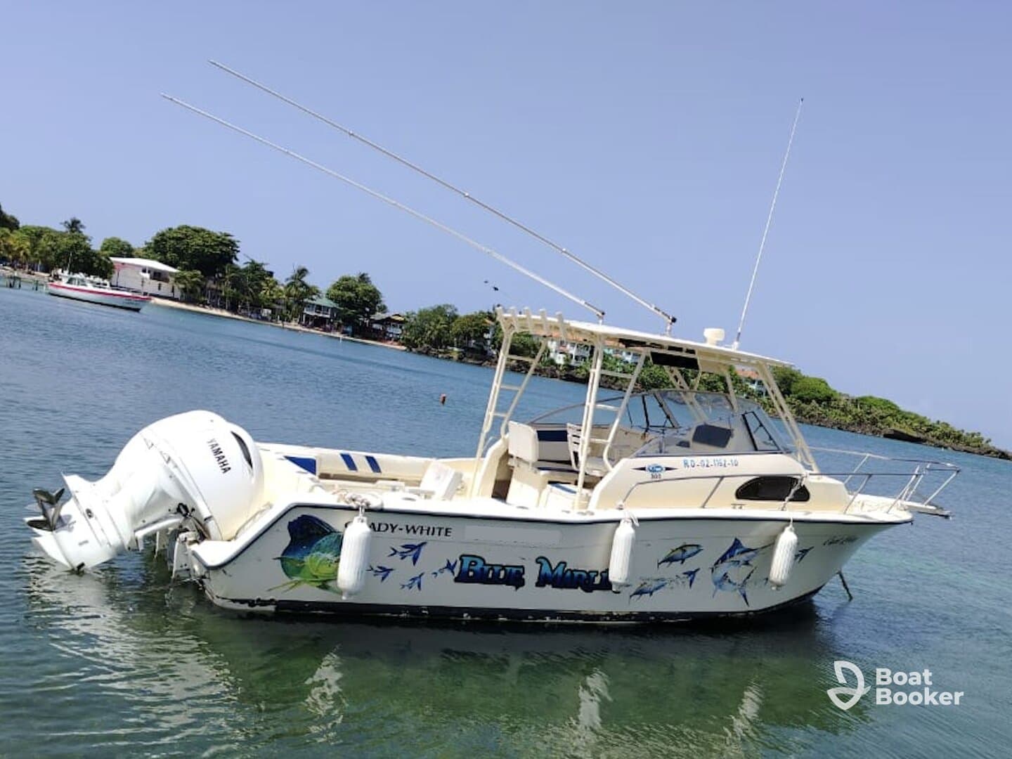A well-maintained fishing boat named 'Bite Me' docked in calm waters, showcasing its sleek design and fishing gear — perfect for a day out on the water.