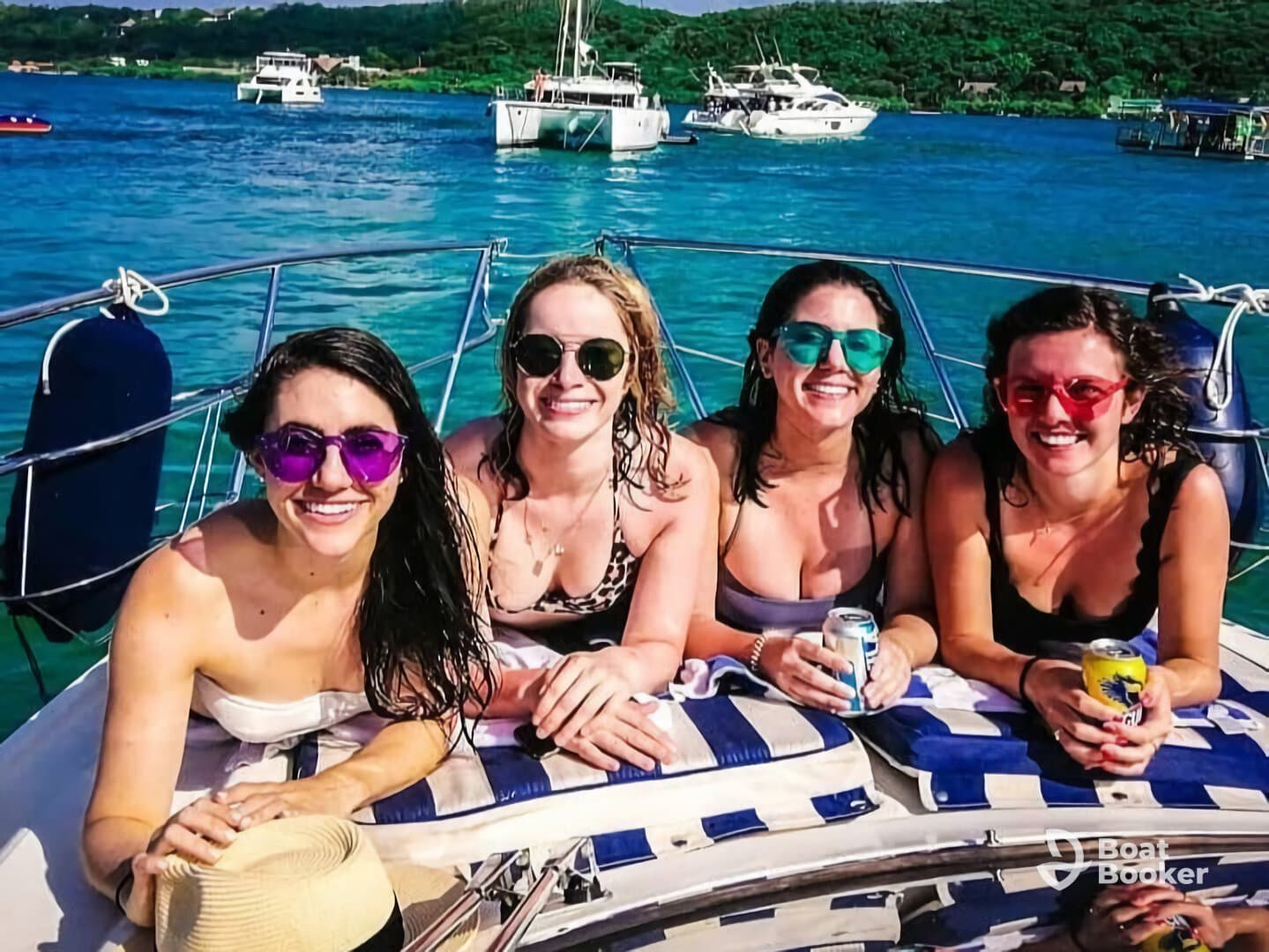 A group of friends enjoys a fun day on a yacht, sipping drinks and soaking up the sun — perfect for celebrations and memorable outings on the water.