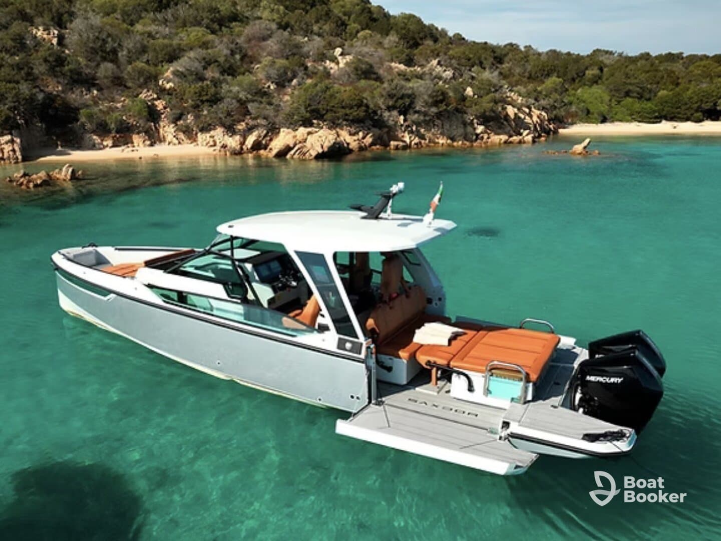 A stunning aerial view of a sleek yacht anchored in crystal-clear waters, showcasing its elegant design and inviting deck space — perfect for luxurious getaways.