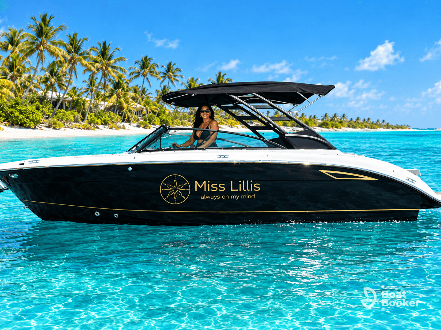 A woman enjoys a sunny day on the sleek 'Miss Lillis' boat, surrounded by stunning turquoise waters and tropical scenery — perfect for a day of adventure on the water.
