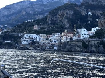 A stunning view of the Amalfi Coast, showcasing picturesque buildings nestled against the cliffs, perfect for capturing the beauty of coastal Italy.