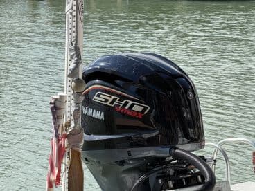 Close-up of a Yamaha outboard engine, showcasing its sleek design and functionality — an essential component for any boating adventure.