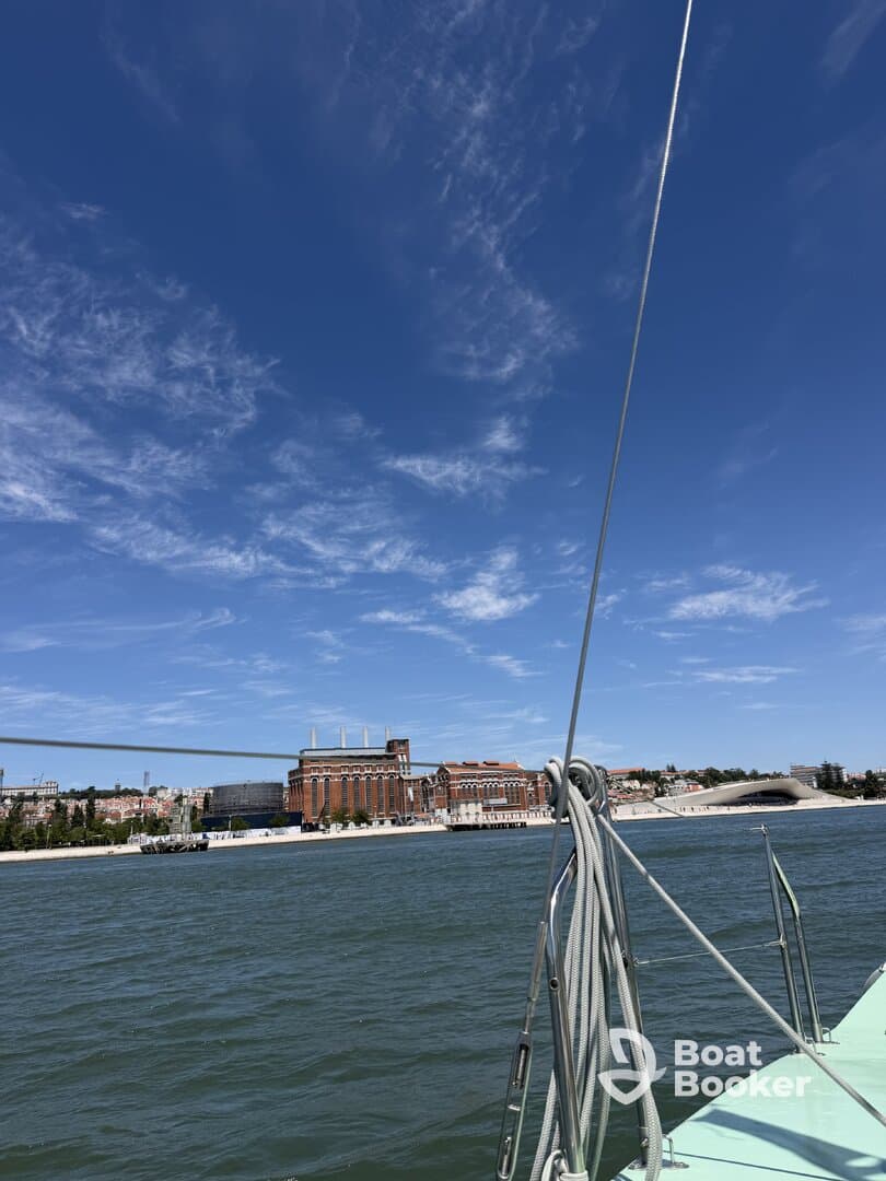 A scenic view from a yacht showcasing the beautiful skyline and architecture along the waterfront, perfect for leisurely sailing experiences.