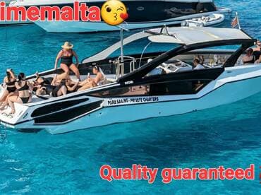 A lively group enjoys a private charter on a stunning boat, soaking up the sun and celebrating in the crystal-clear waters of Malta.