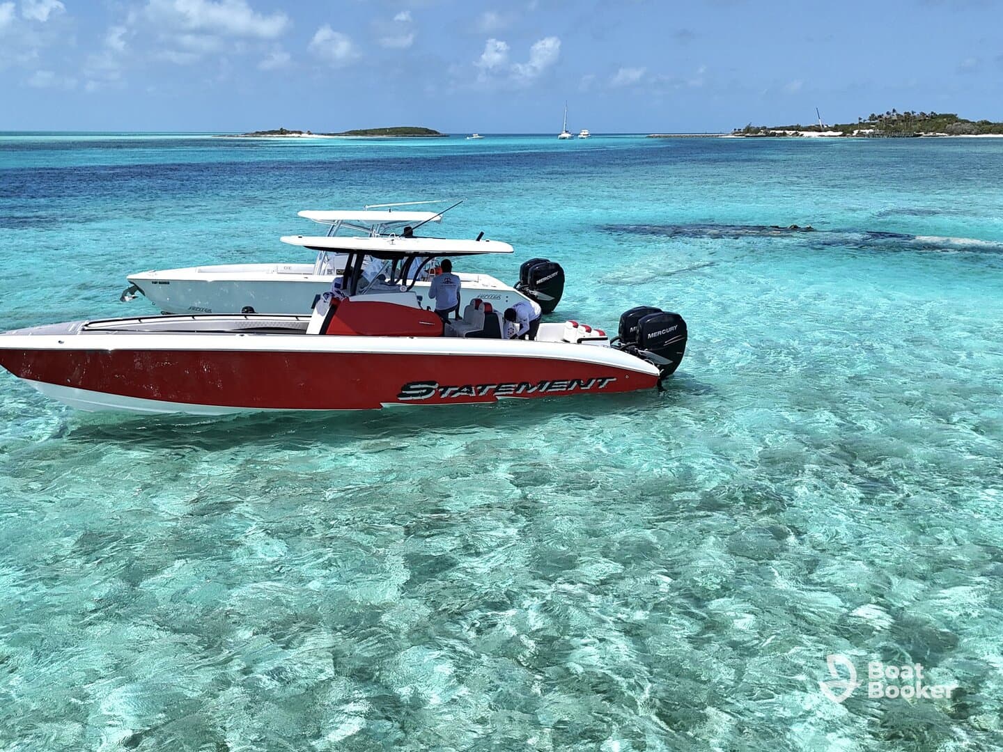 A sleek speedboat navigates through crystal-clear turquoise waters, showcasing the beauty of the surrounding islands — perfect for adventurous outings.