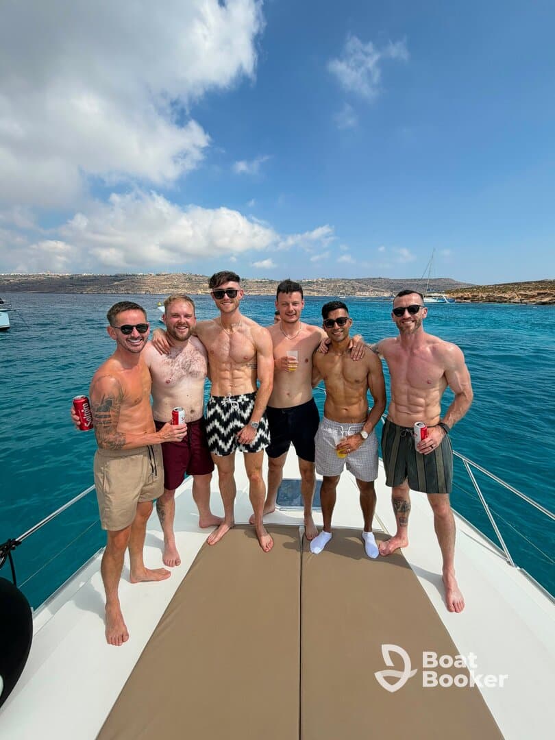 A group of friends enjoys a fun day on the water, celebrating together on a boat — perfect for summer outings and memorable adventures.