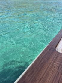 An unclear view of the water surface, lacking identifiable subjects or context.