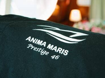 Close-up of the logo on a fabric item related to the Anima Maris Prestige 46, showcasing branding details.