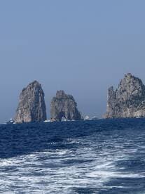 A stunning view of iconic rock formations off the coast, showcasing the natural beauty of the destination — perfect for sightseeing and coastal tours.