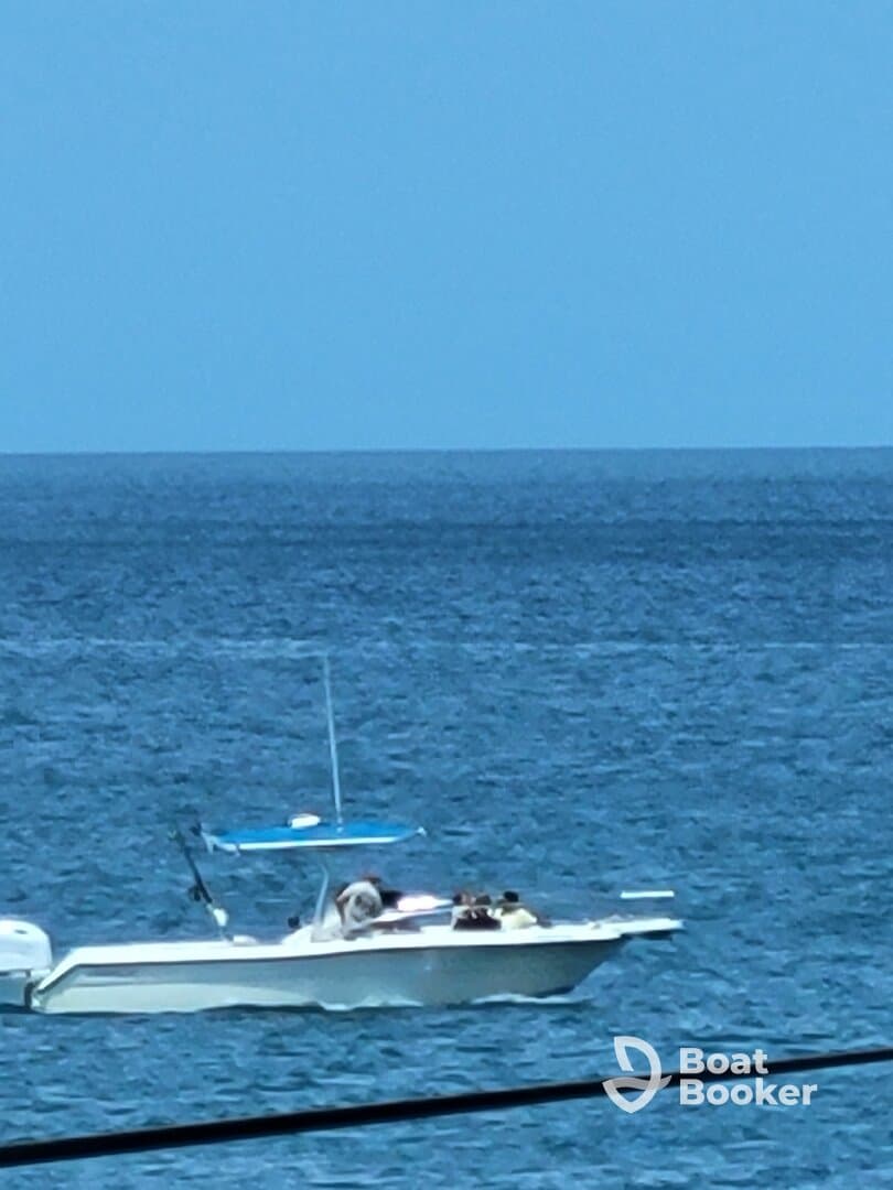 A group enjoys a day on the water aboard a boat, making the most of their aquatic adventure.