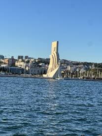 A picturesque view of a prominent landmark along the harbor, showcasing the beauty of the waterfront and surrounding cityscape.