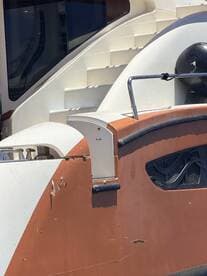 Close-up view of a boat's exterior, showcasing its structure and design details, ideal for boat enthusiasts and potential renters.