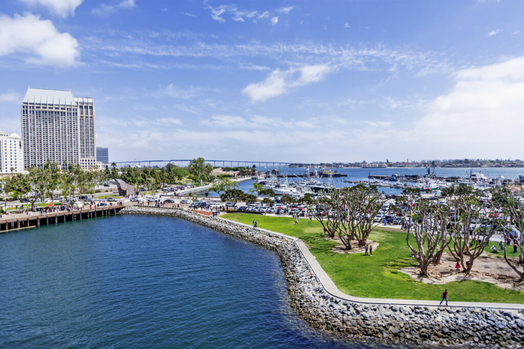 An aerial view of San Diego Harbor with boats in the background